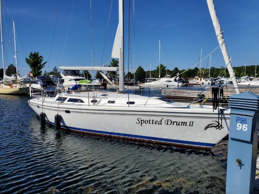 The sailboat Spotted Drum II moored in the marina